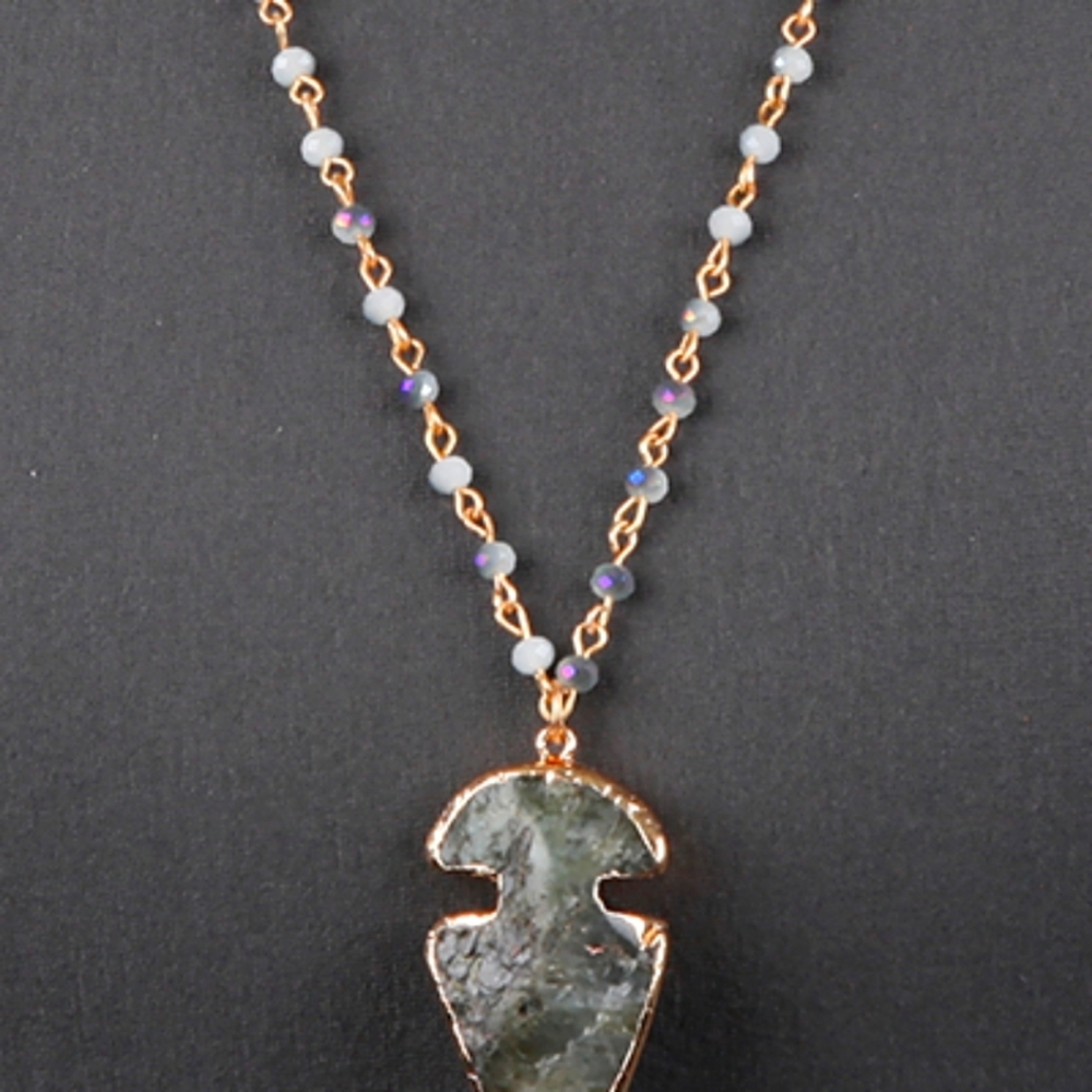 Beaded Necklace Featuring Crafted Beads and a Stunning Pendant Design